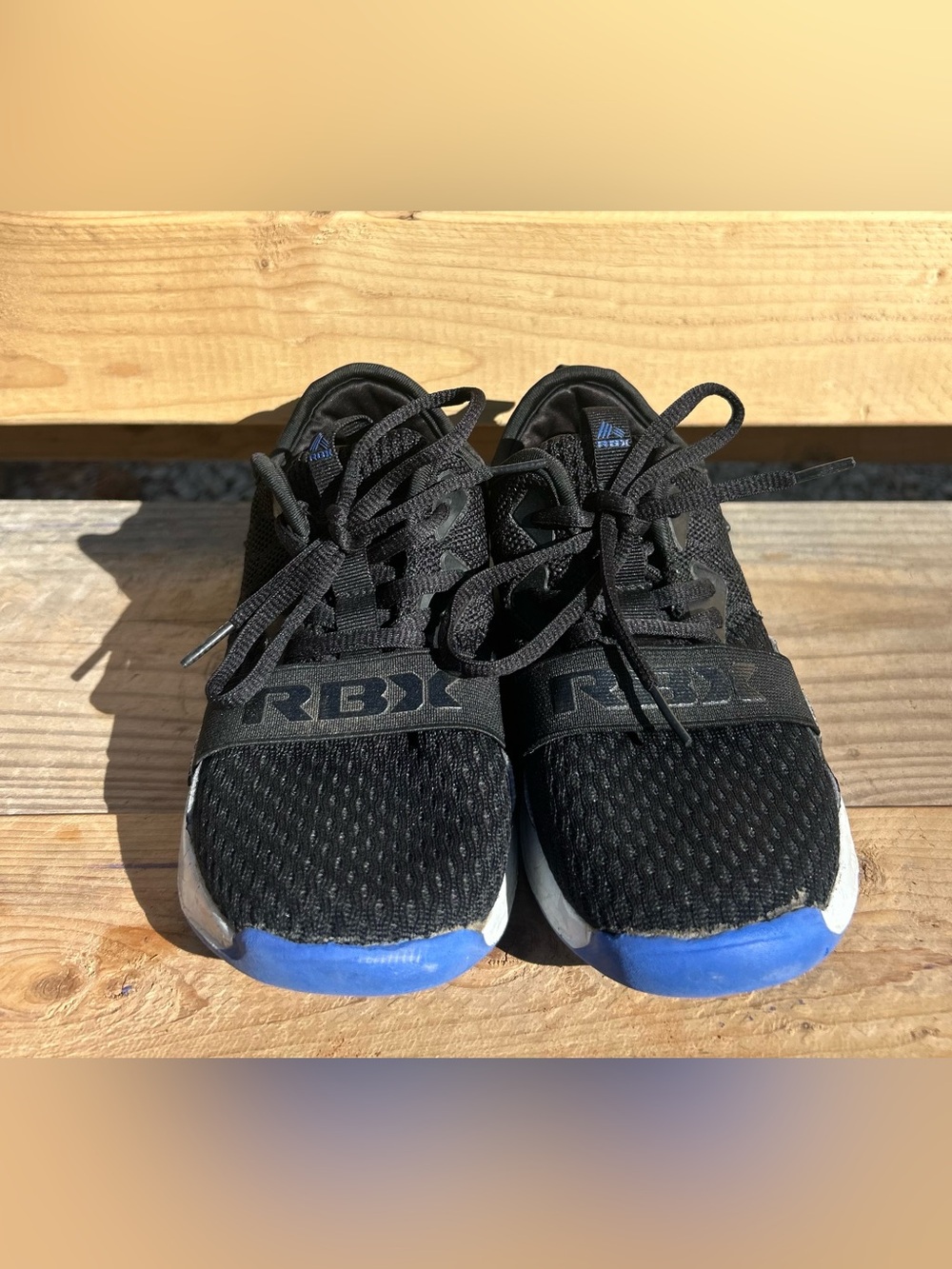 Reebok Kids Black Sneakers with Blue Toe Accent